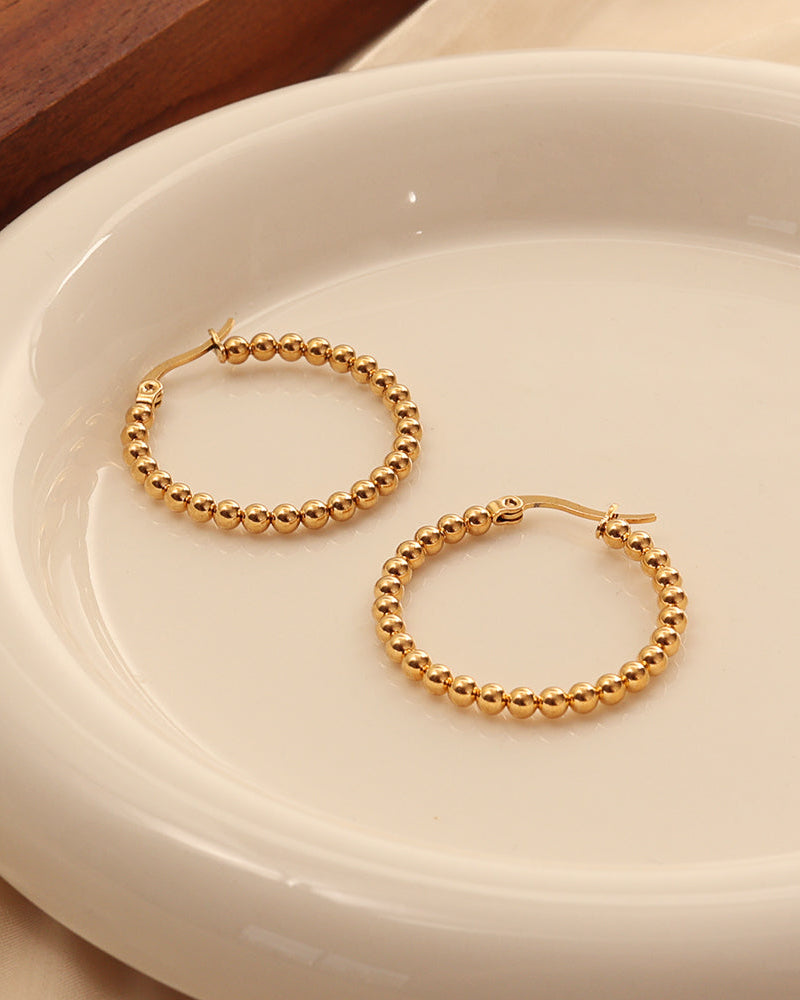 Arete Mujer Arco en acero inoxidable con recubrimiento PVD de 18K | Xihe By Dm