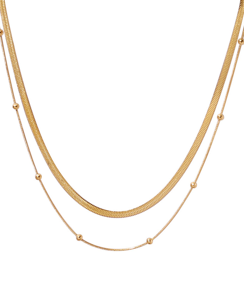 Collar Dúo Serpentina en acero inoxidable con PVD oro 18K