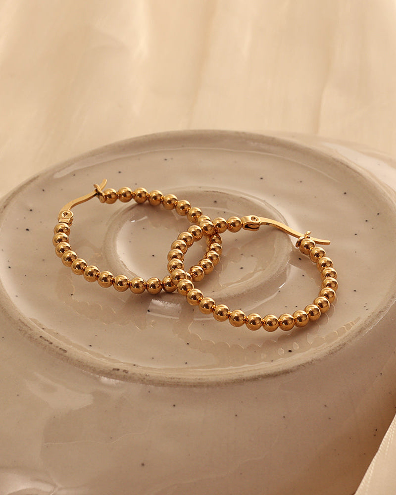 Arete Mujer Arco en acero inoxidable con recubrimiento PVD de 18K | Xihe By Dm